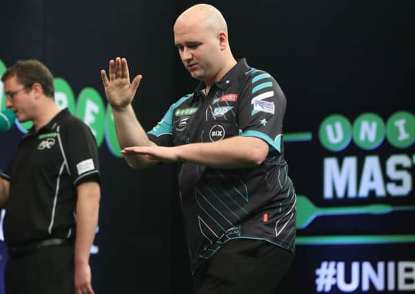 Rob Cross at the oche during his quarter-final defeat to Mensur Suljovic at the Unibet Masters. Picture courtesy Lawrence Lustig/PDC