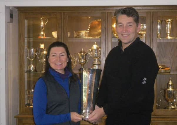 Chris and Jo Dyson withe the trophy