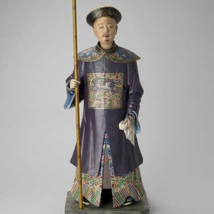 Clay figure of a standing Chinese man late eighteenth century (Photograph: Royal Collection/Royal Pavilion Brighton and Hove)