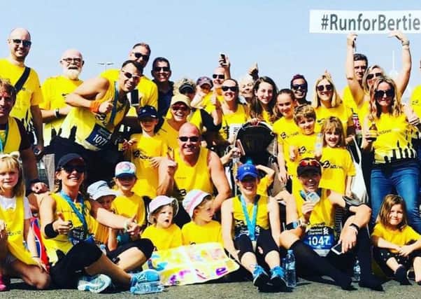 'Team Bertie' ran the Dubai marathon to raise funds for Woodlands Meed School in Burgess Hill SUS-180130-172153001