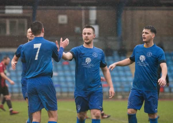 Midhurst celebrate their third goal at the Withdean / Picture by David Jeffery