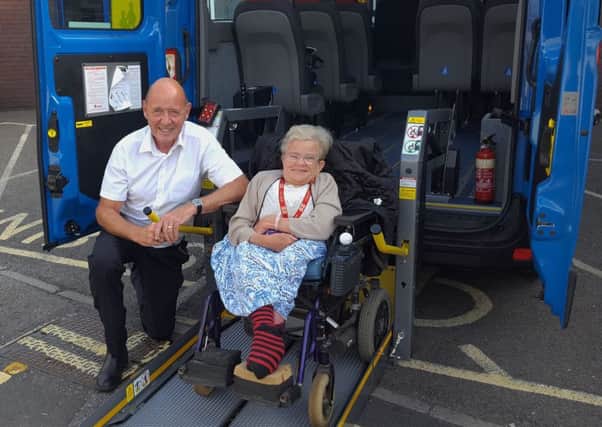 Worthing Dial a Ride manager Gary Mills with regular customer Jeanette Richard