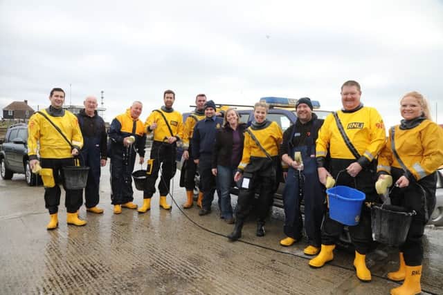 Rye Harbour lifeboat charity car wash. Photo by KT Bruce. SUS-180131-113008001