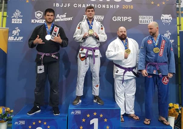 Georgijs Rogolevs (centre) on the top step of the podium at the European Jiu Jitsu Championship 2018.