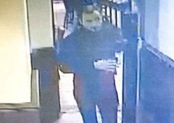 Police would like to speak to this man in connection with an unprovoked pub attack in Littlehampton. Picture: Sussex Police