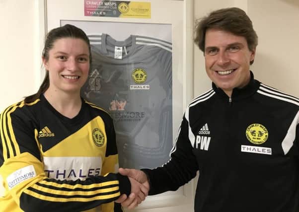 Rachel Palmer shakes on the deal with Crawley Wasps boss Paul Walker SUS-180130-003303002
