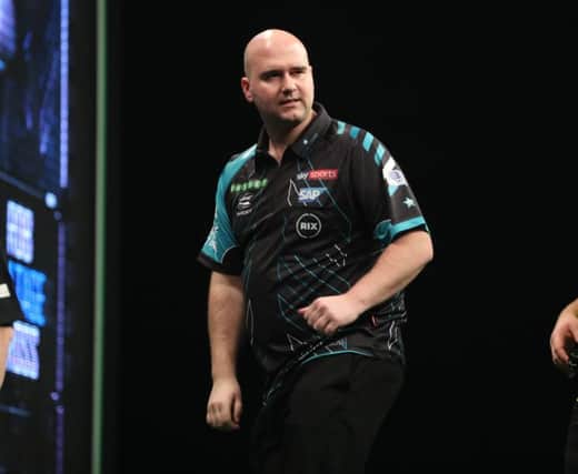 Rob Cross at the oche against Michael van Gerwen on the opening night of the 2018 Unibet Premier League. Picture courtesy Lawrence Lustig/PDC