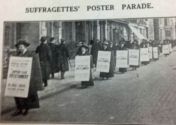 Suffragettes marching in Hastings SUS-180702-091644001