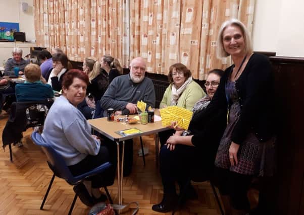 Homecall Scheme Manager Leah Norman (right) with people attending the charity's 11th Annual Winter Quiz Evening SUS-180602-112123001