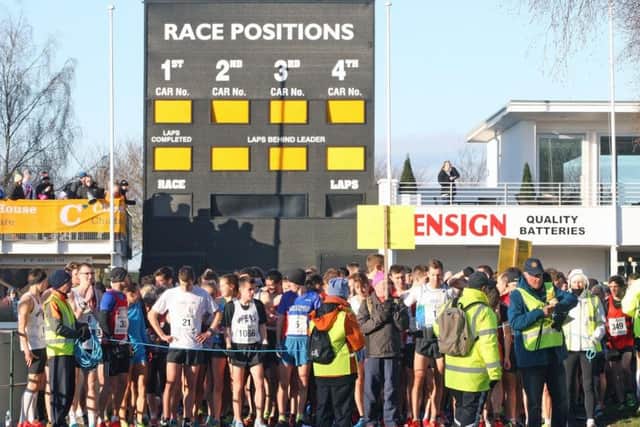 Runners ready for the start outside Goodwood motor circuit / Picture by Derek Martin