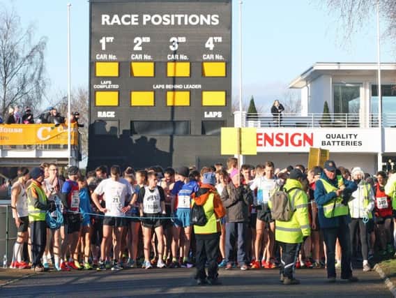 Runners ready for the start outside Goodwood motor circuit / Picture by Derek Martin