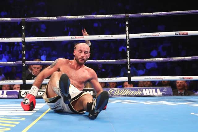 Ben Jones on the canvas after being knocked over in the sixth round by Reece Bellotti.
Picture by Lawrence Lustig/Matchroom Ringside photos and Mark Robinson/Matchroom Backstage photography