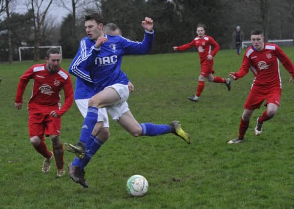 Action from the Macron East Sussex Football League Premier Division clash between St Leonards Social and Ore Athletic. Picture by Simon Newstead