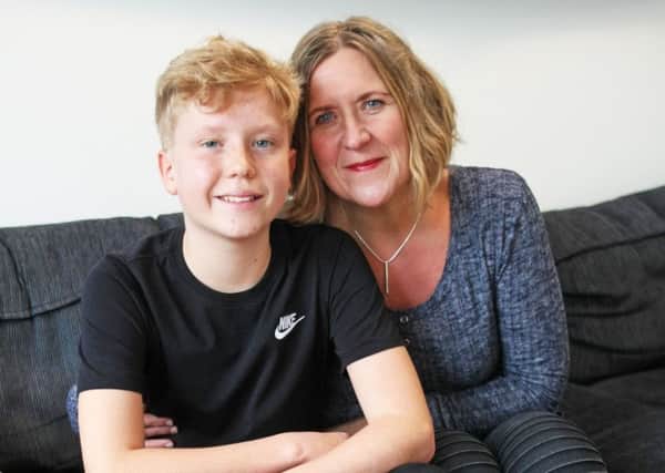Steyning mother Sarah Petty calls for safe crossing point after her son Finn was hit by a car on his walk home from school. Photo by Derek Martin
