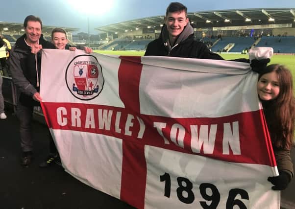 Crawley Town fans John Davis with his children Jake, Jed and Jasmine who live in Rotherham at the Chesterfield game. 
Picture by Steve Herbert SUS-180502-190815002