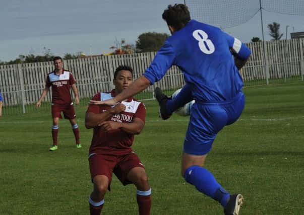 Action from Little Common's league victory at home to Storrington in late September. Picture by Simon Newstead