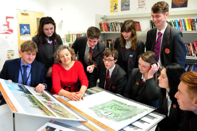 Jenny Clough, interim head and Steven Apsey, head of sixth form, looking at the plans for the new school with pupils. All pictures Kate Shemilt ks180032-5