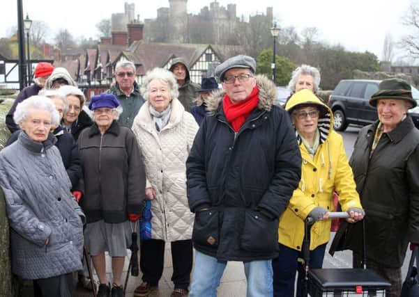 Colin Stepney and other Arundel residents recently gathered to protest against new delivery charges at the Lloyds Pharmacy. Picture: Derek Martin