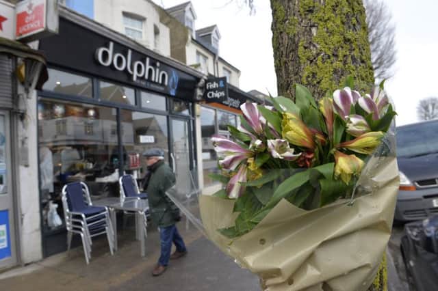 Floral tributes at the scene where a man sadly died in a collision in Seaside, Eastbourne  (Photo by Jon Rigby) SUS-180102-100839008