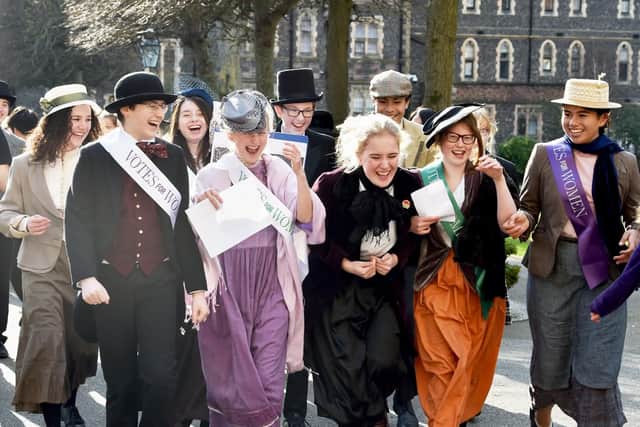 Votes for women! Students at Brighton College recreate a suffragette march