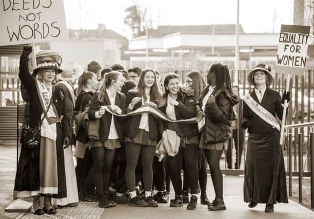 Surprise: Lewes Suffragettes greet local students as they arrive for the free screening of the film. Photograph by Katie Vandyck