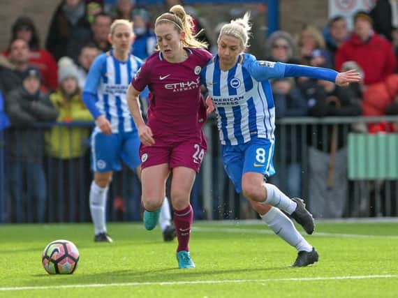 Kirsty Barton in action against Manchester City. Picture by Geoff Penn/BHAFC