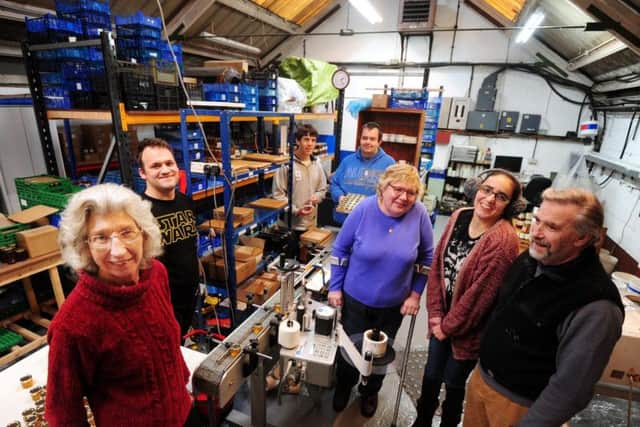 Delighted with the new equipment for use in the packing department, Auntie Val, (Val Challis), front left, with her Jammy Dodges, including husband Andy Challis, Dean Andrrews, Jake Blackman, James West, Tracy Money, and Laura Merahie