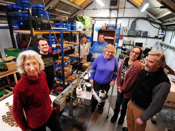Delighted with the new equipment for use in the packing department, Auntie Val, (Val Challis), front left, with her Jammy Dodges, including husband Andy Challis, Dean Andrrews, Jake Blackman, James West, Tracy Money, and Laura Merahie