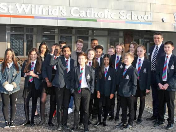 Headteacher Michael Ferry and some of the students at St Wilfrid's