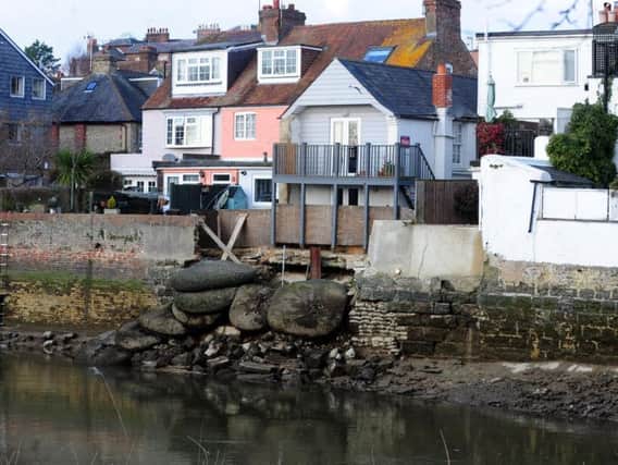 The river wall collapse could be a very costly repair. Pictures: Kate Shemilt