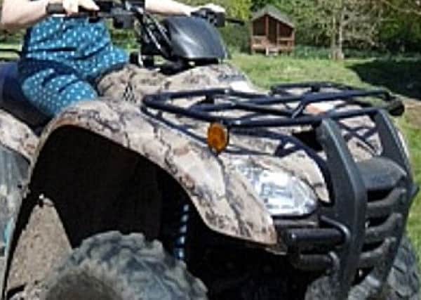 Police are on the lookout for this camouflage quad bike, stolen from Petworth. Picture: Sussex Police
