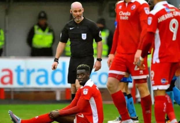 Enzio Boldewijn is floored which led to a penalty being awarded and Reds' first goal.
Picture by Steve Robards