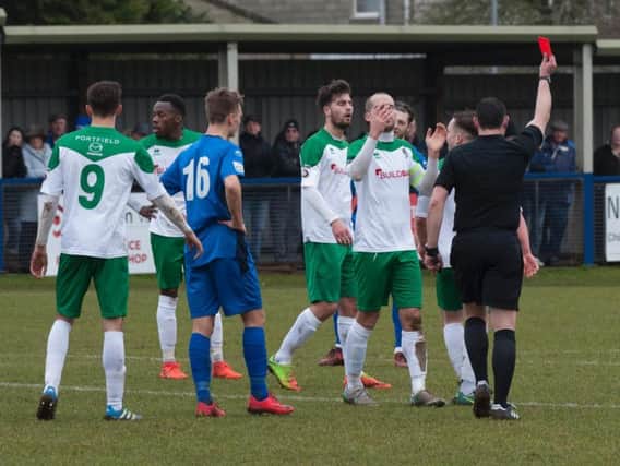 Calvin Davies is shown a controversial red card at Chippenham / Picture by Tommy McMillan