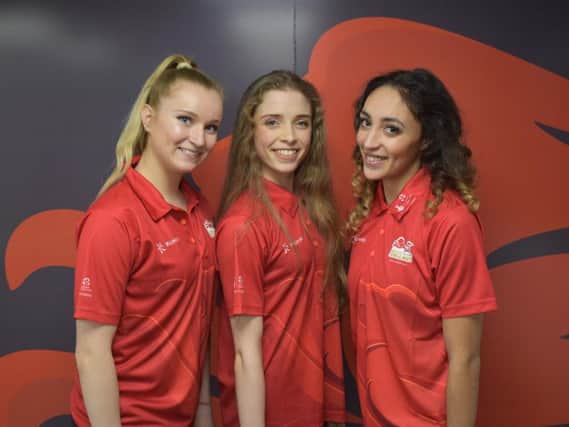 Hannah Martin (centre) will compete at the Commonwealth Games with teammates Mimi and Stephani