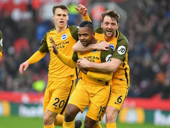 Jose Izquierdo celebrates his goal at Stoke with Solly March and Dale Stephens. Picture by Phil Westlake (PW Sporting Photography)