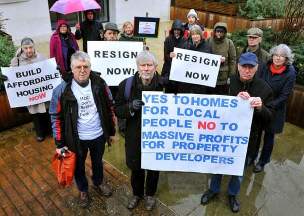 Paul Kornykcy has finally got a copy of an unredacted report on affordable housing at North Horsham 2,750 home development written by Dixon Searle Partnership, seen here with fellow campaigners. Pic Steve Robards SR1804384 SUS-180213-133514001