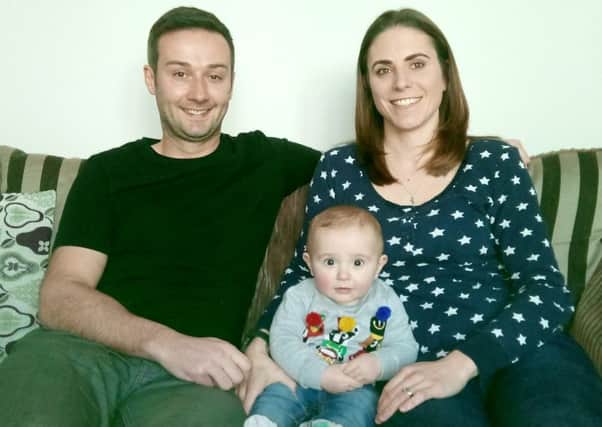 Chris and Gayle Sloggett with baby Jasper, now ten months