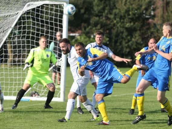 Rustington are still in with a chance of winning the treble this season. Picture by Derek Martin