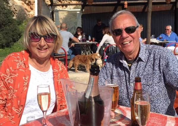 Dave and Trish Guildford from Littlehampton while in Ferragudo in Portugal, where they stayed for the winter