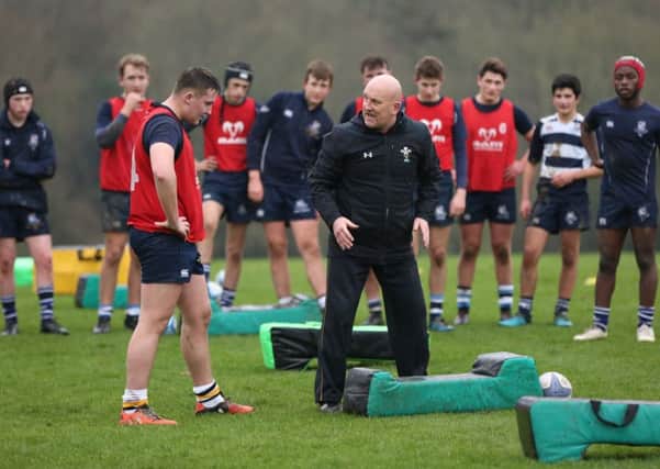 Shaun Edwards takes the students through some rugby drills at Seaford