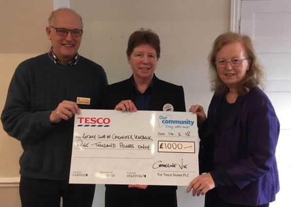 Representatives from the Rotary Club of Chichester Harbour with their cheque