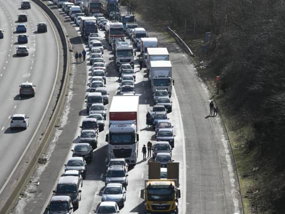 Thousands have been stuck on the M23 following a crash this morning.