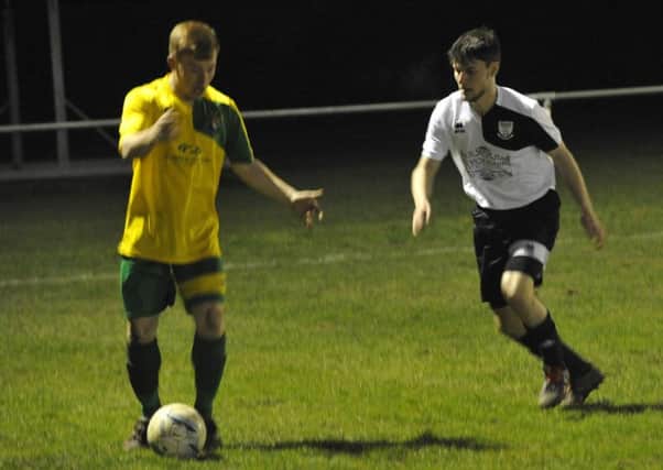 Action from Bexhill United's last outing, a 3-1 defeat at home to Hailsham Town on Wednesday, last week. Picture by Simon Newstead
