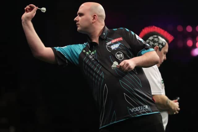 Rob Cross at the oche en route to victory in Newcastle. Picture courtesy Lawrence Lustig/PDC