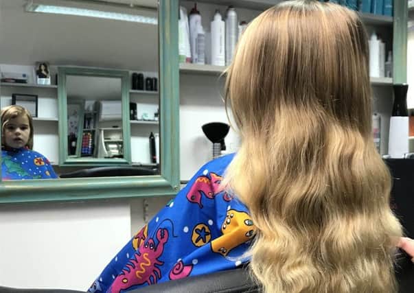 Olivia Hanson's flowing locks prior to being  cut to raise funds for The Little Princess Trust charity