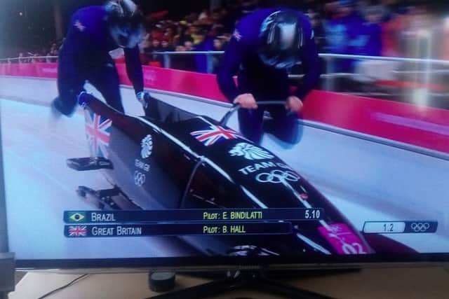 Team GB pilot and former Crawley AC decathlete Brad Hall, right, in action with Joel Fearon compete in heat one of the Two-Man Bobsleigh event held at the Sliding Centre at PyeongChang in South Korea.Picture by Graham Carter SUS-180218-130601002