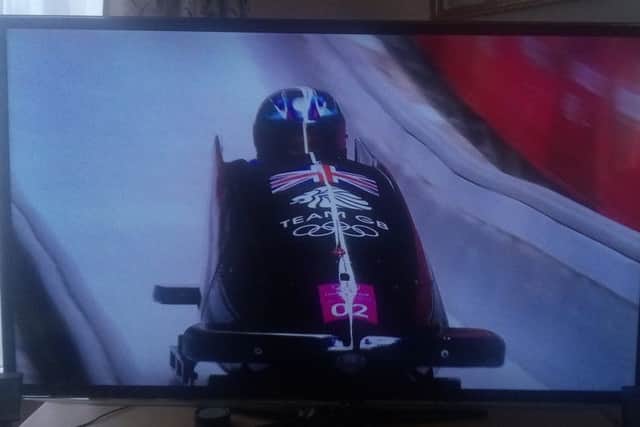 Team GB bobsleigh star Brad Hall in action in Heat 2.Picture by Graham Carter SUS-180218-161708002
