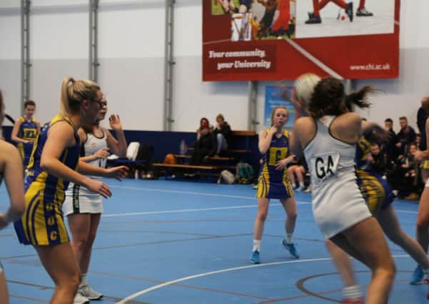 Netball action in the University of Chichester dome