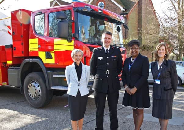Council Leader Louise Goldsmith, Chief Fire Officer Gavin Watts, Cabinet Member for Safer, Stronger Communities Debbie Kennard and Executive Director Communities and Public Protection Nicola Bulbeck with the new aerial ladder platform.