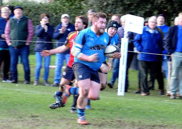 Front row Dane Gingell powers towards the line to score Chichesters sixth and final try / Picture by Kate Shemilt